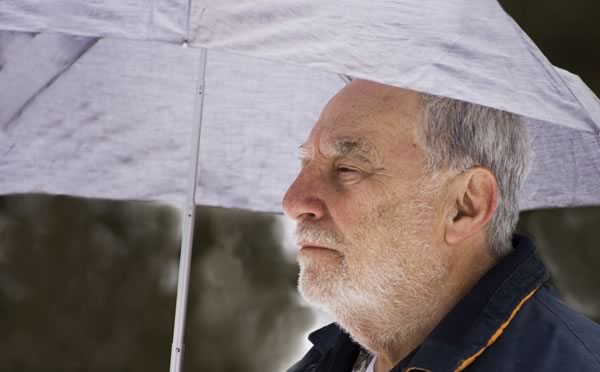 Man holding an umbrella